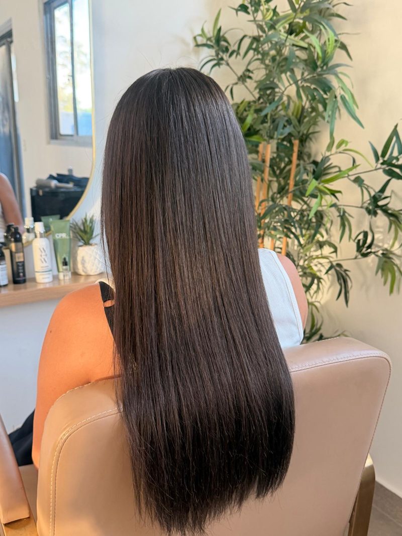 Long glossy brunette hair, smoothed and finished
